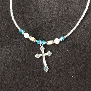 blue pearl cross necklace from Mardel’s